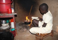 Sidonge girl cooking in kitchen