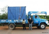 Hannington & Vivian standing besides Kudura after we caught up with it some 60KM outside Sidonge